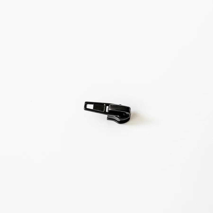 Slider for roll zipper